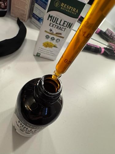Bottle of mullein extract with a dropper being used, Respira Botanica product in the background.